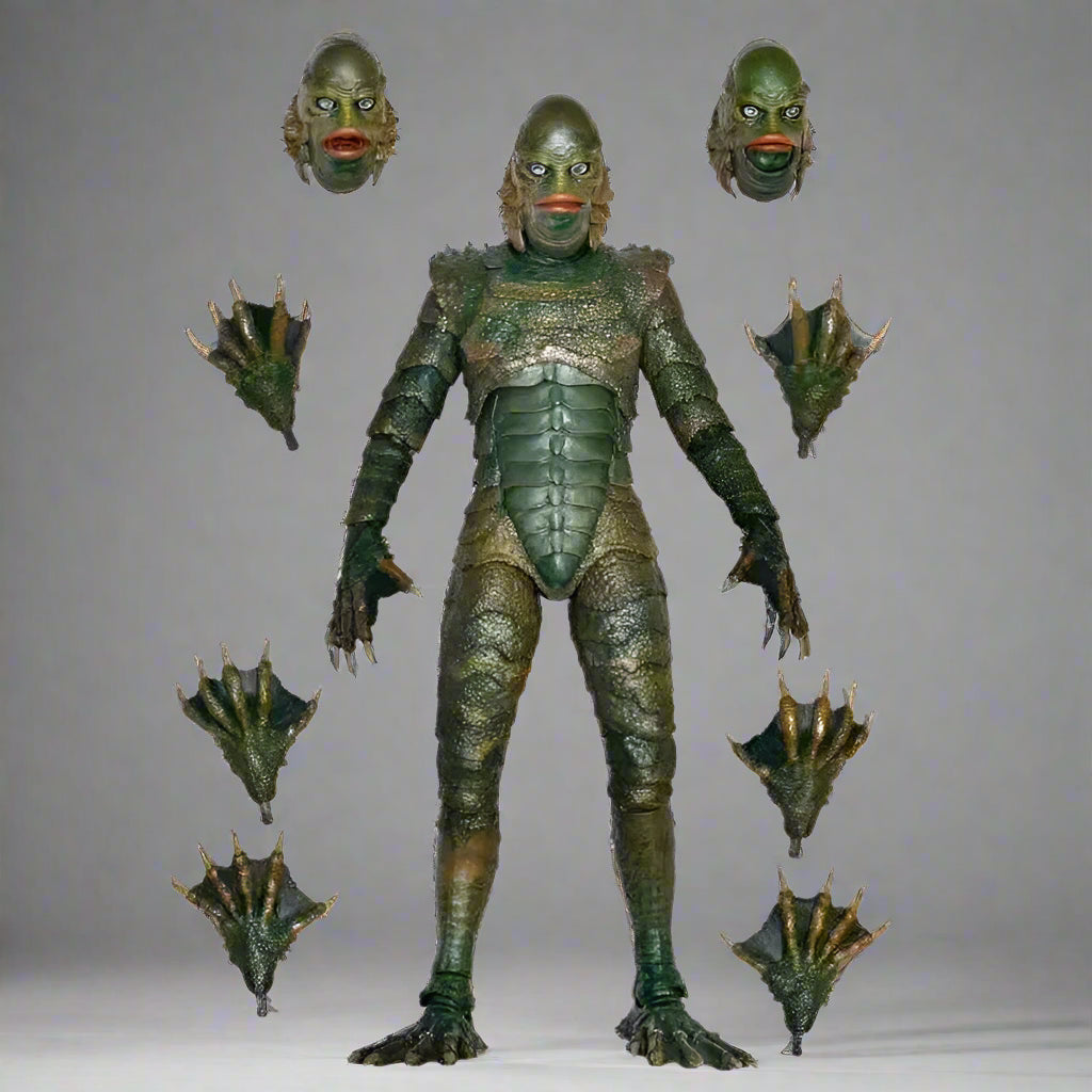 Green alien action figure with interchangeable heads and limbs on a white background