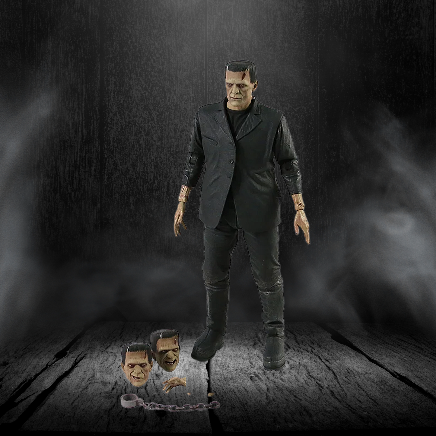 Frankenstein's monster figure with a chained head on a dark background