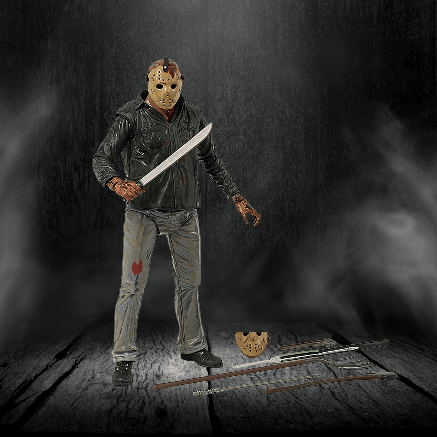 Action figure with a mask and knife on a dark background
