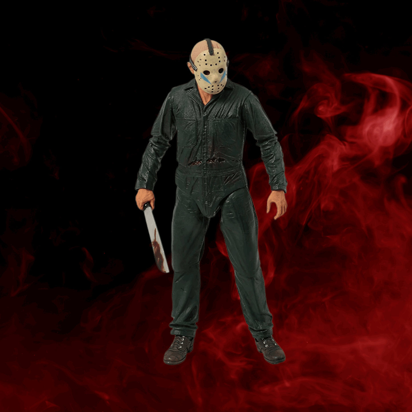 Action figure with a mask and knife on a dark background