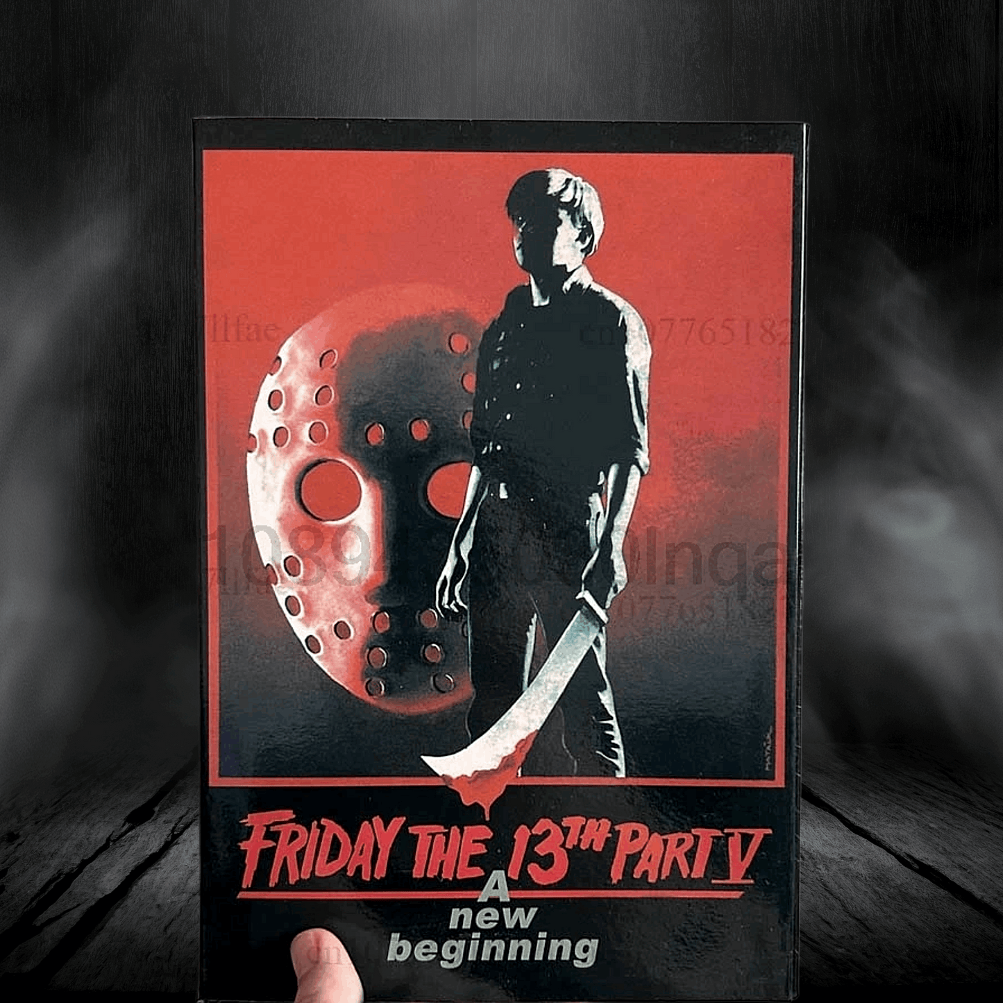 VHS tape cover of 'Friday the 13th Party V: A New Beginning' with a silhouette of a character holding a knife and a mask.