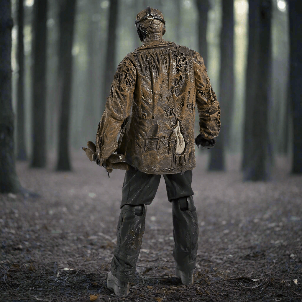 Person wearing a camouflage jacket and pants walking through a forest.