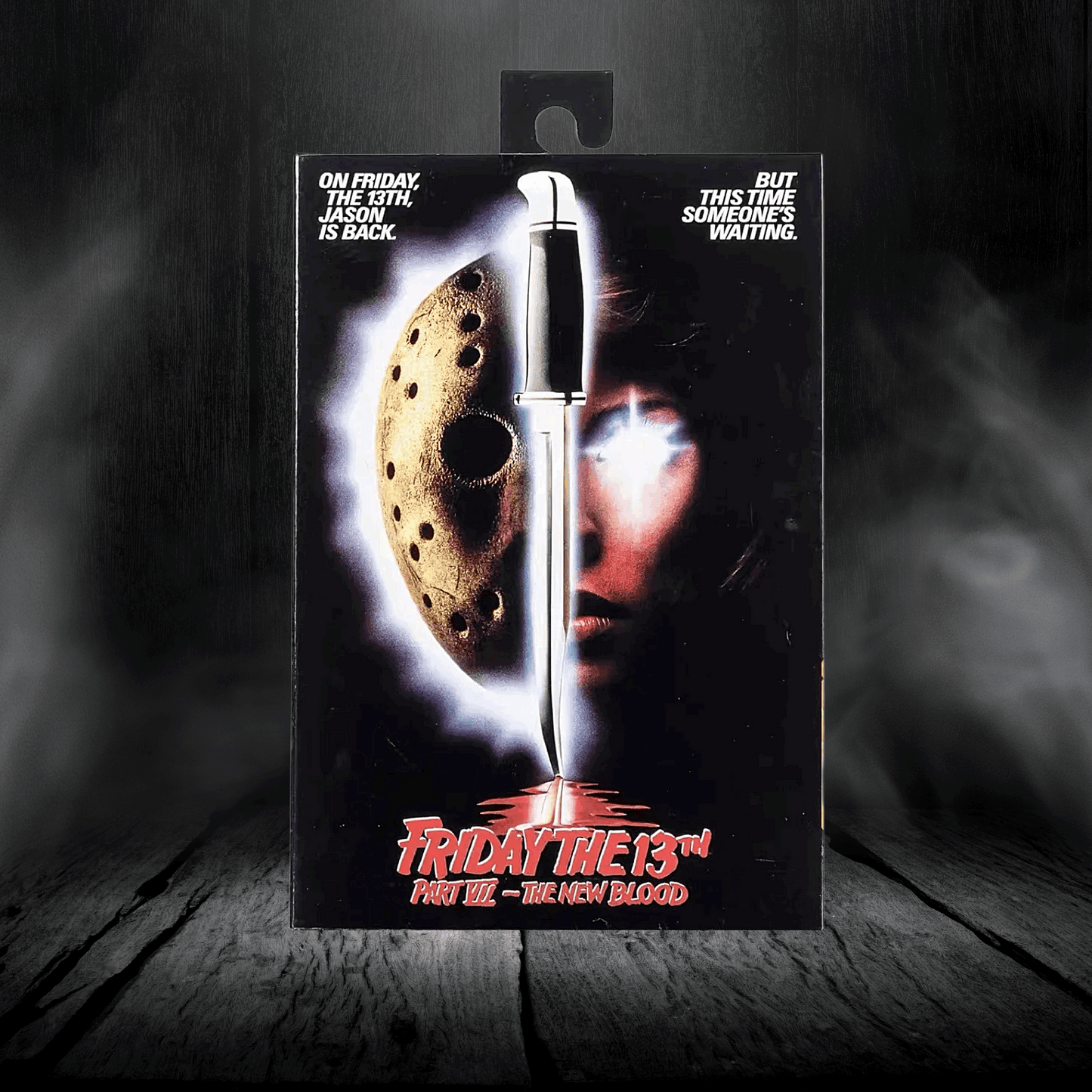 Packaged toy figure of a character from 'Friday the 13th' series on a dark background