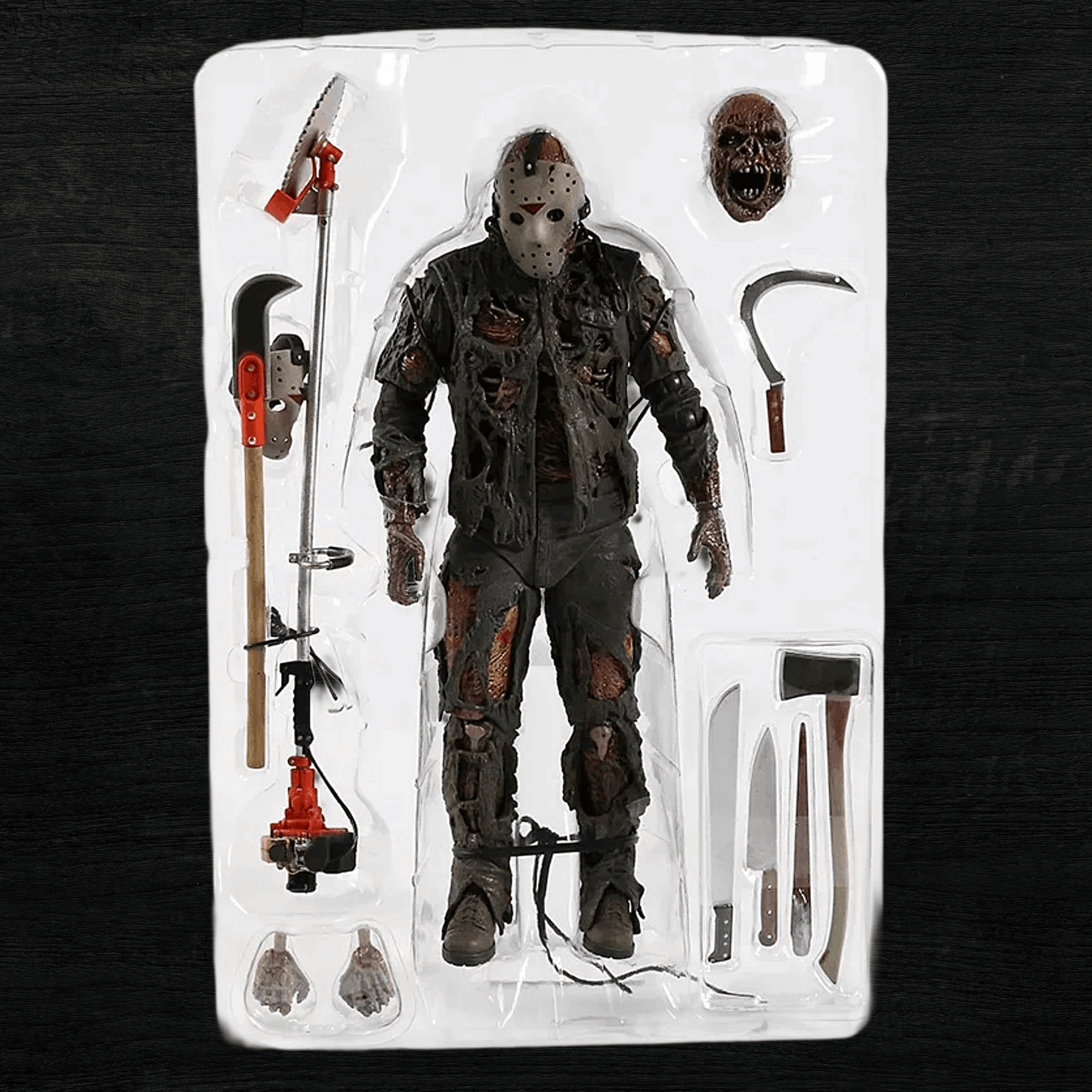 Action figure in a clear packaging tray with tools on a dark background