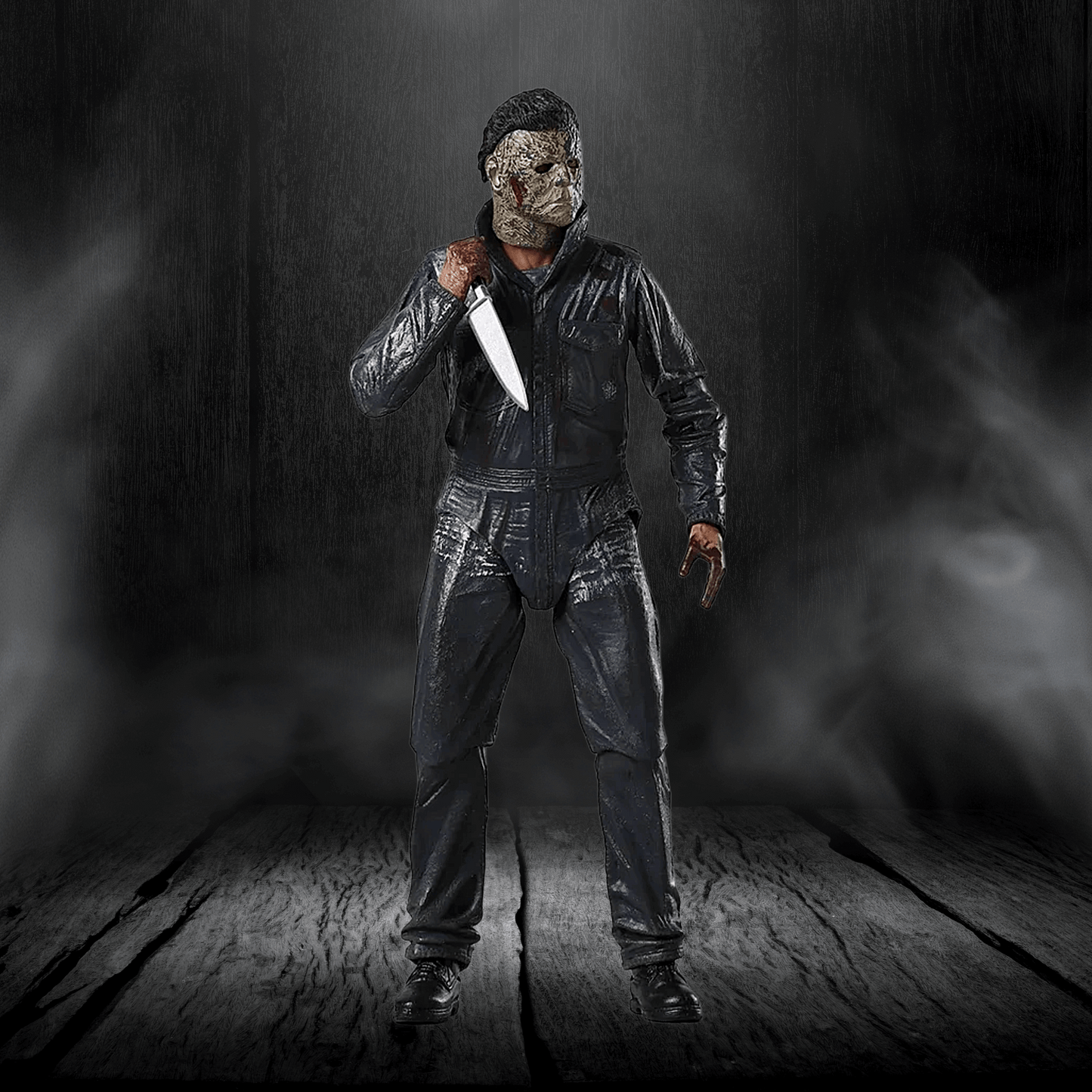 Person in a dark costume holding a knife against a dark background