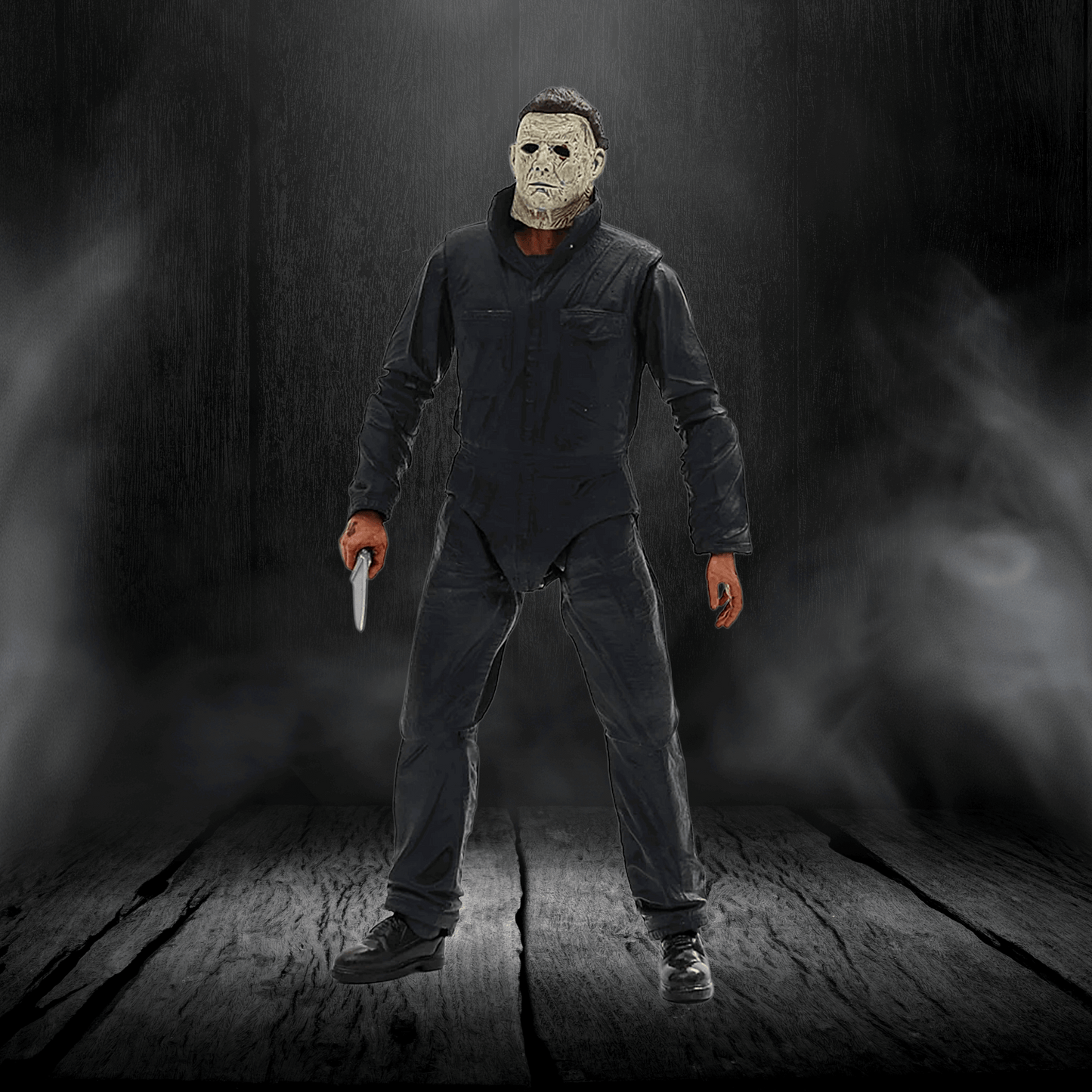 Action figure in a dark setting holding a knife