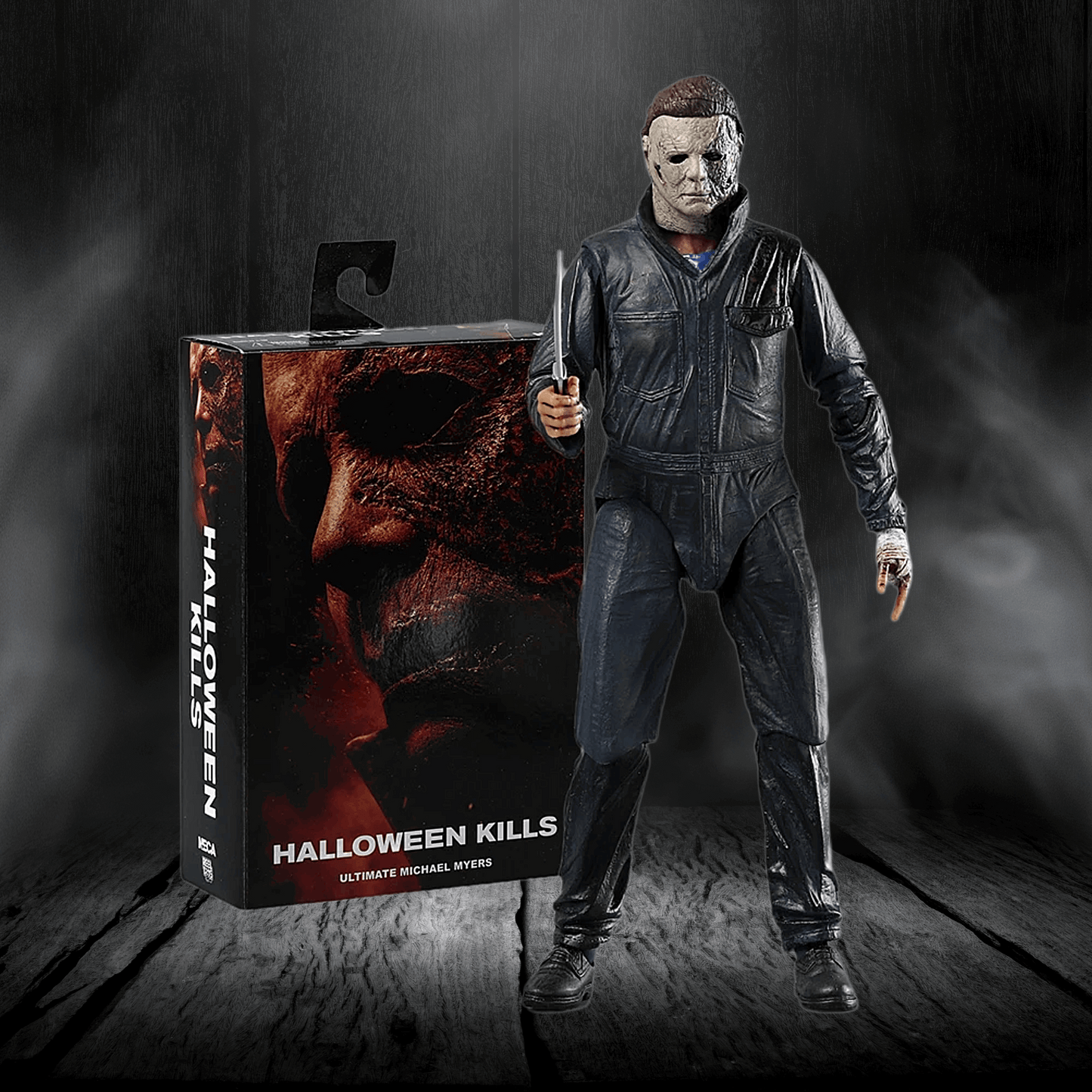 Action figure of Michael Myers from 'Halloween Kills' next to its packaging on a dark background