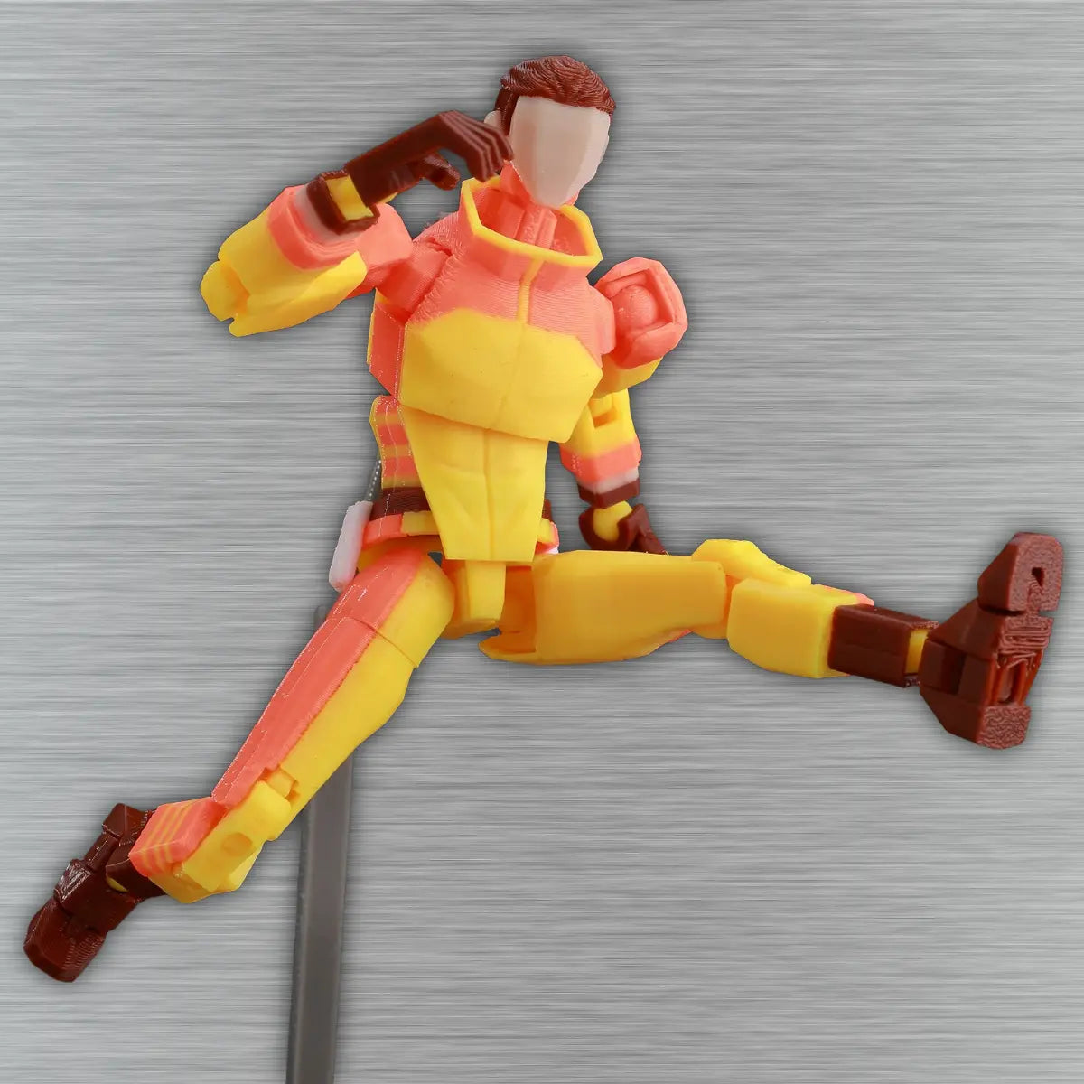 Toy figure in a dynamic pose on a textured gray background