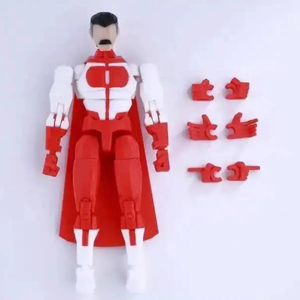 Red and white superhero action figure with interchangeable parts on a white background