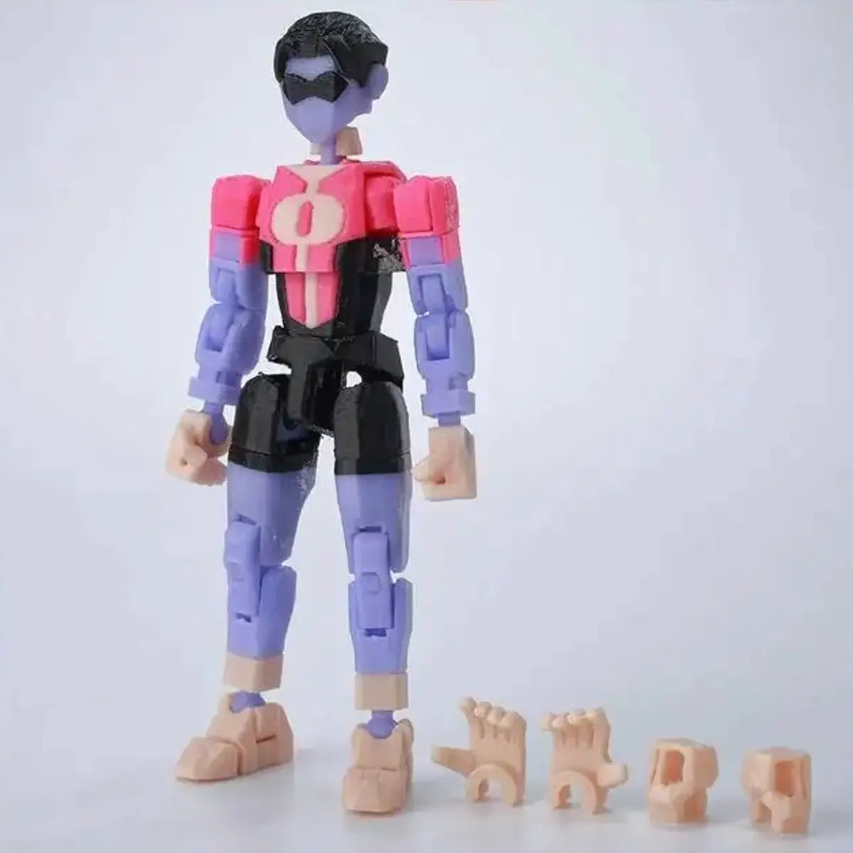 Toy figure with interchangeable parts on a light gray background