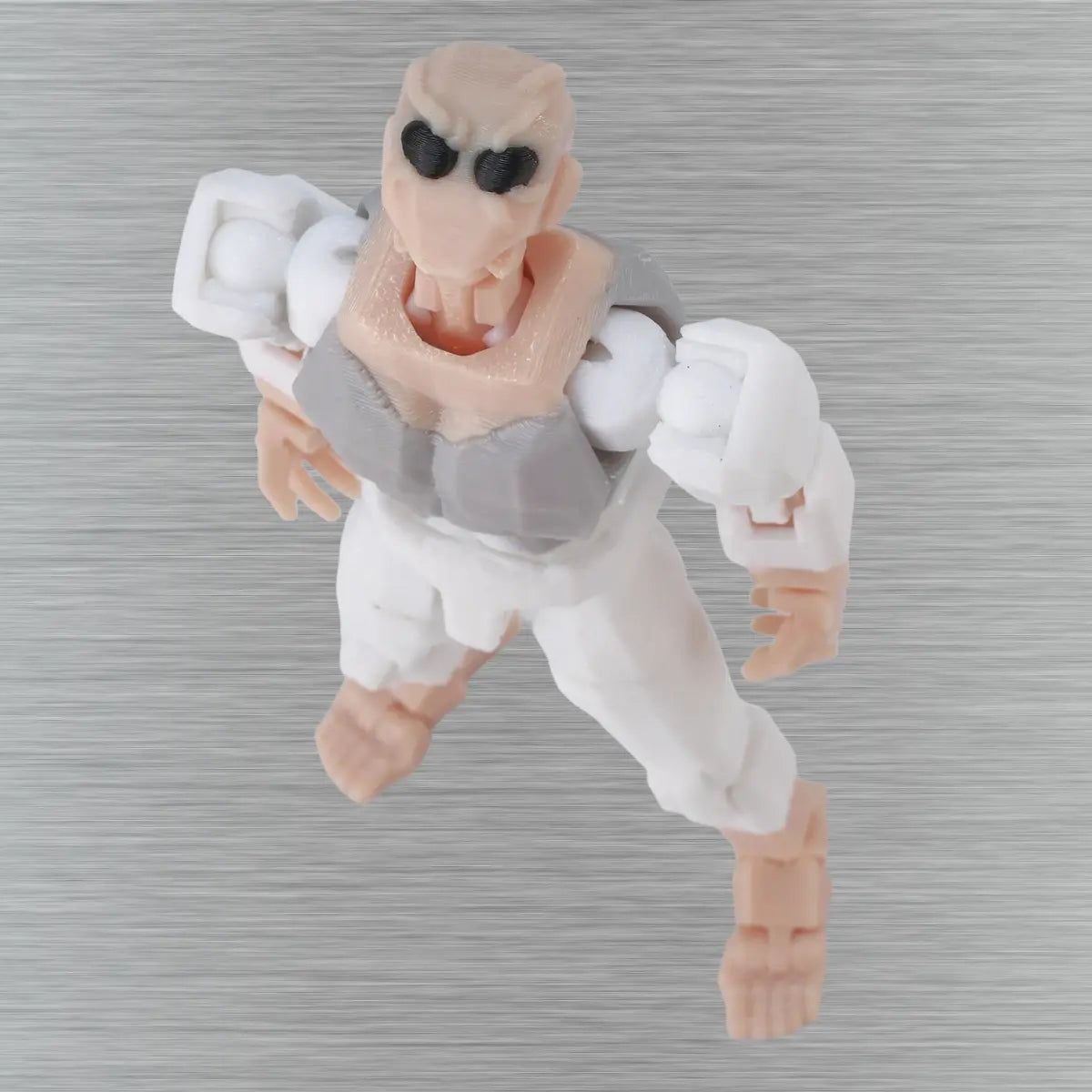 Toy figure of a creature with a gray background