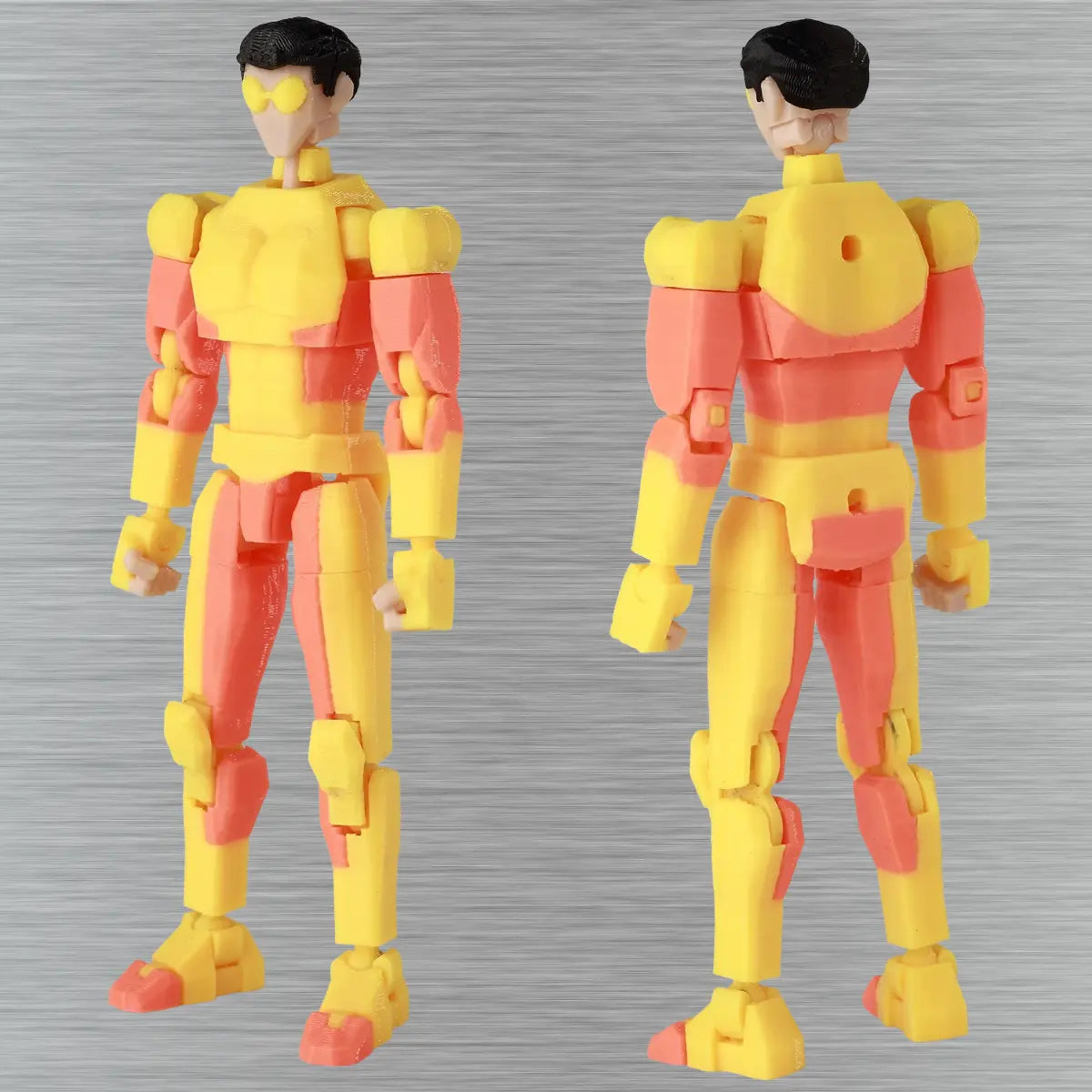 Two yellow and red action figures on a gray background