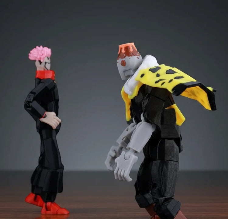 Three colorful action figures on a textured gray surface