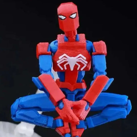 Toy figure of a superhero in red and blue with a spider emblem on a black background