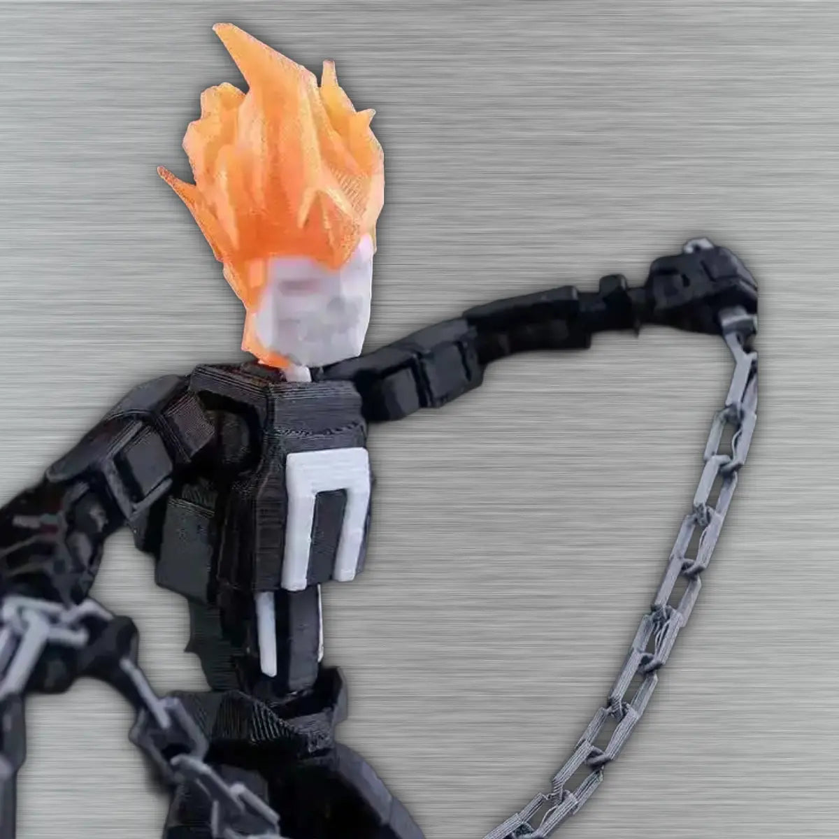 Toy figure with flaming head on a textured gray background