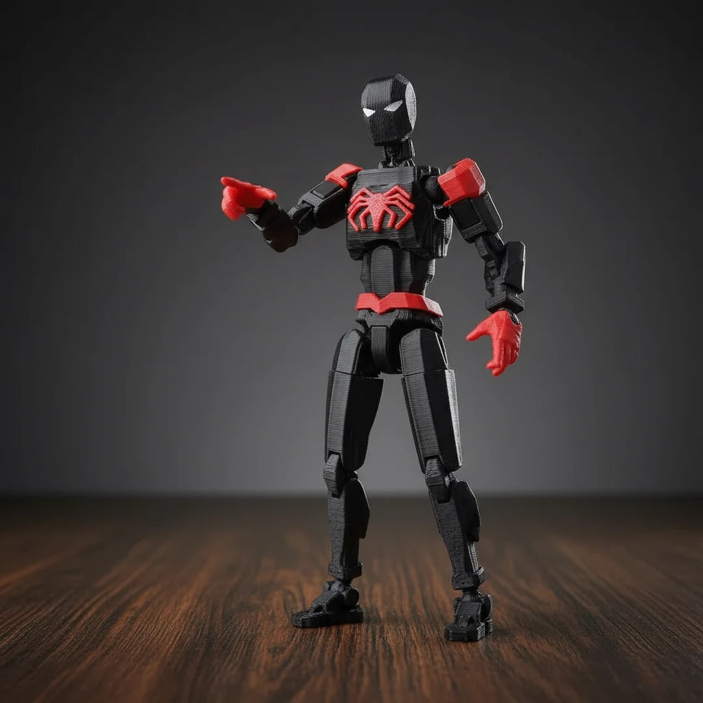 Toy figure of a superhero in black and red costume on a textured gray background