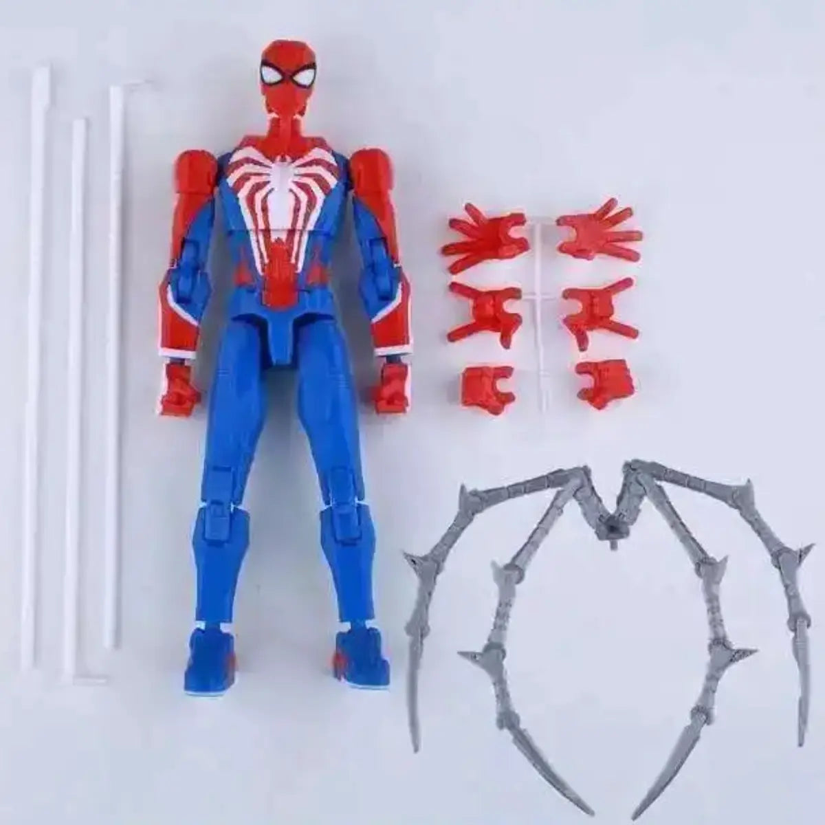 Spider-Man action figure with additional parts on a white background