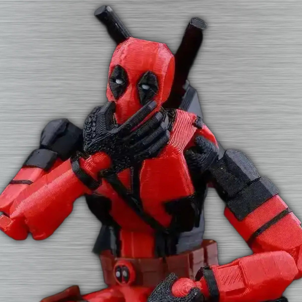 Red and black superhero figure on a textured gray background