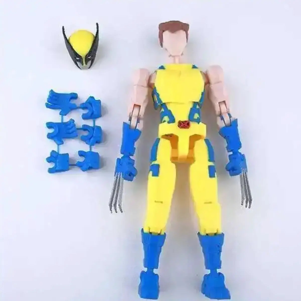 Toy figure of a character in a yellow and blue suit with interchangeable parts on a white background