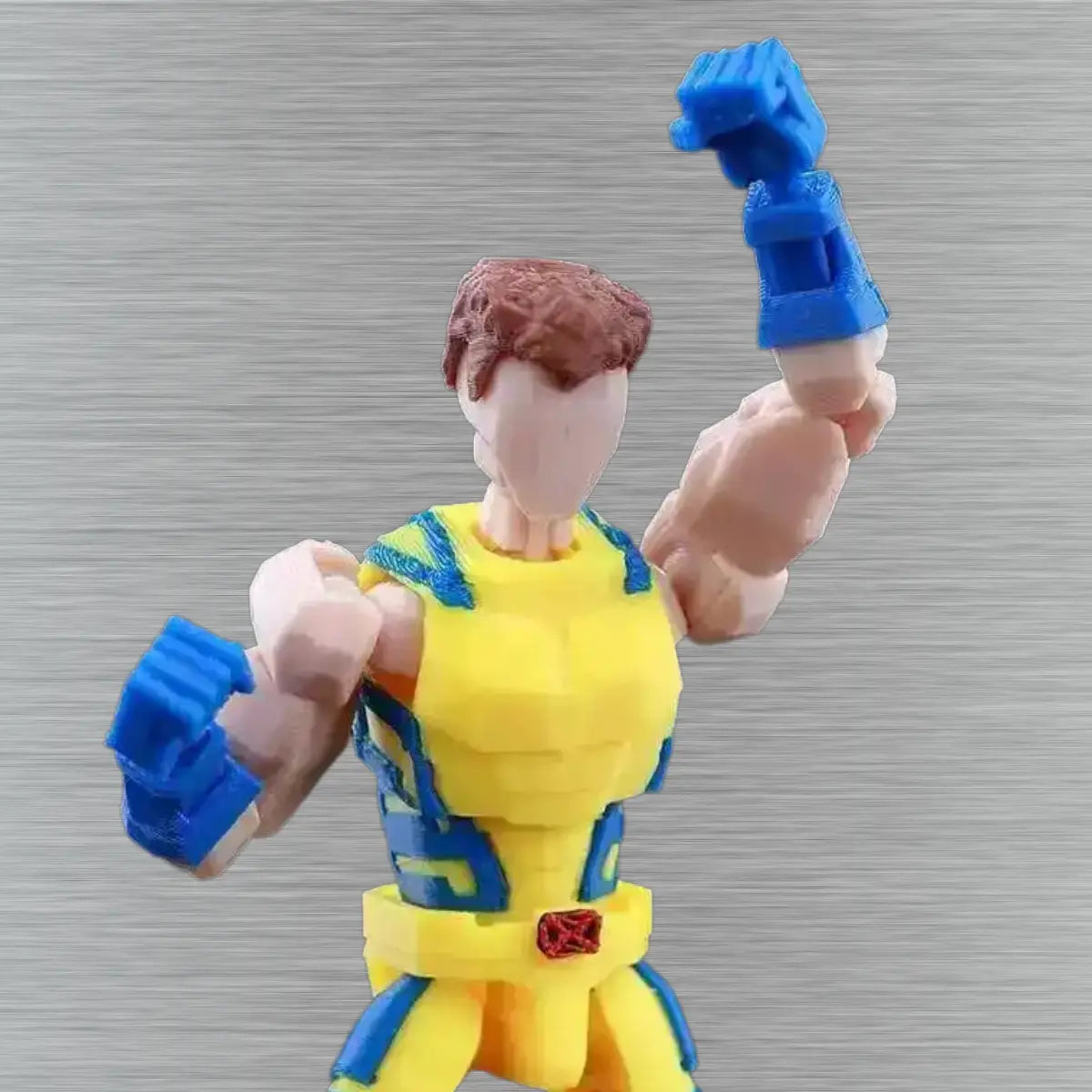 Toy figure with blue gloves and yellow outfit on a gray background