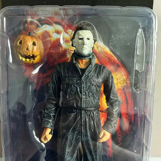 Action figure in a transparent packaging with Halloween-themed design