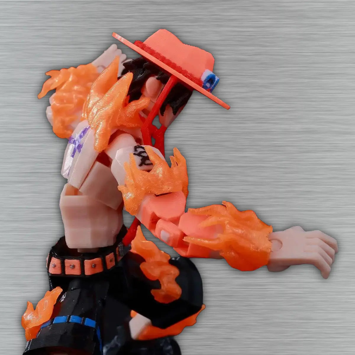 Action figure with orange and black outfit on a textured gray background