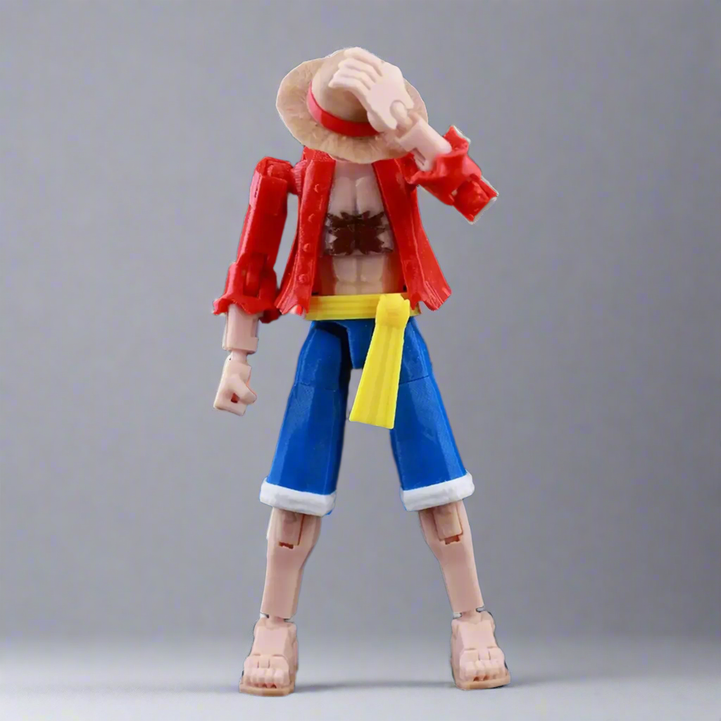 Action figure with a red jacket, blue pants, and yellow belt on a black background