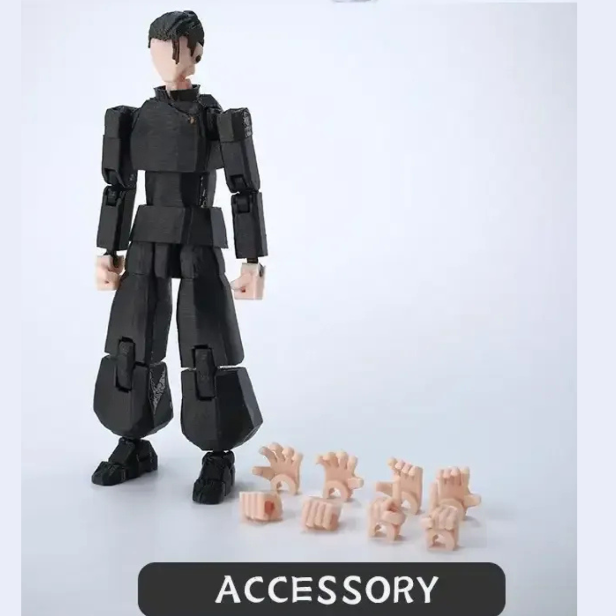 Black robot-like figure with accessories on a light gray background