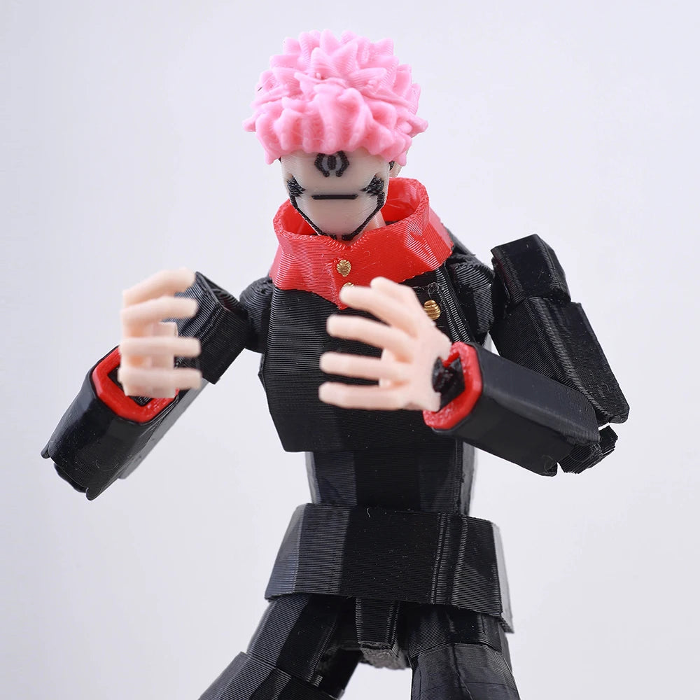 Action figure with pink hair and black and red outfit on a white background