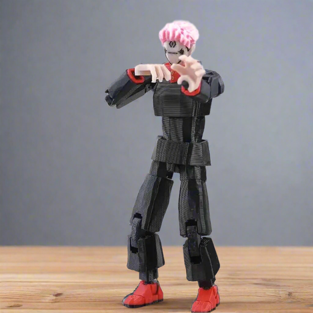 Black robot toy with red accents on a white background