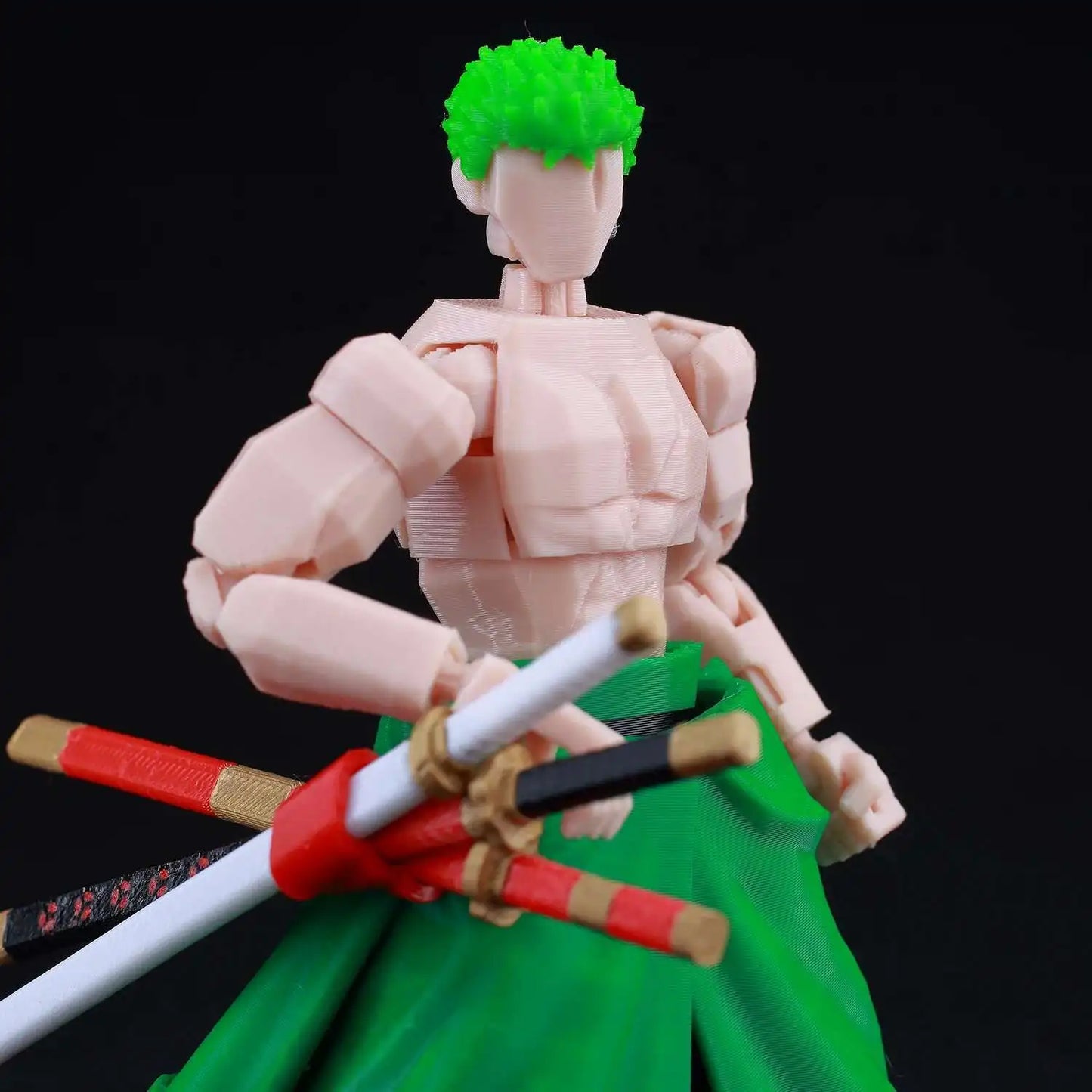 Action figure with green hair and green outfit holding weapons on a black background