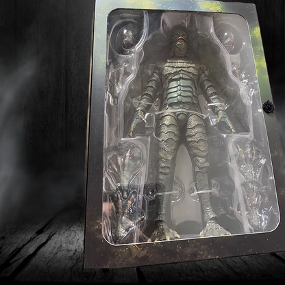Action figure in clear packaging on a dark surface