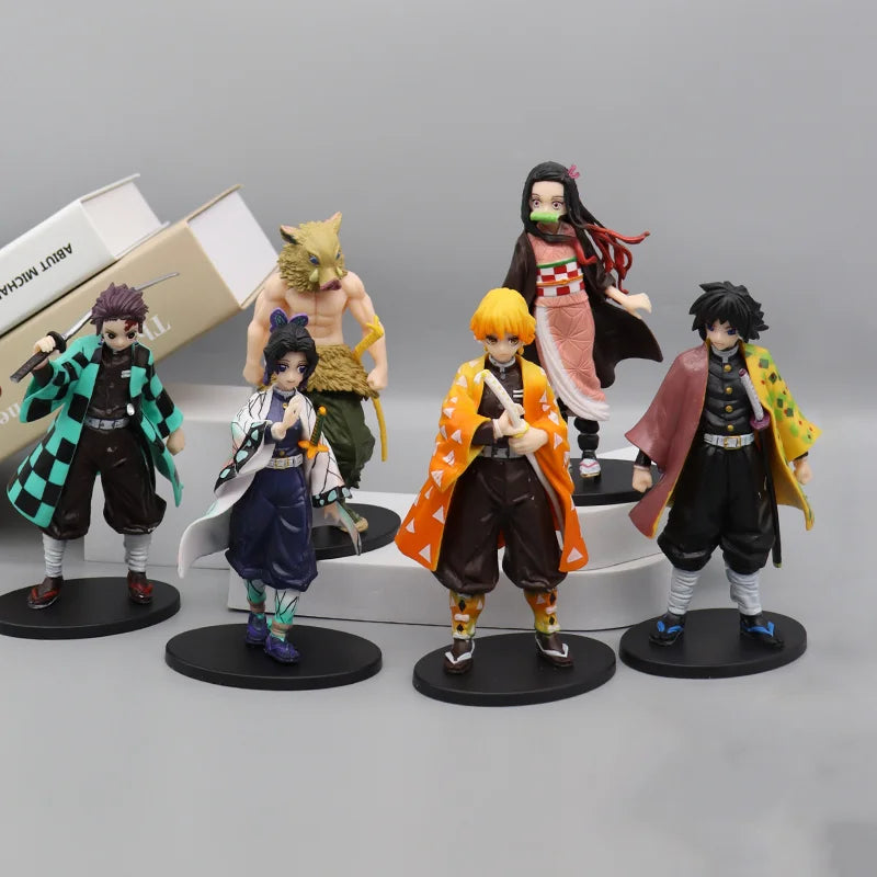 Set of five anime character action figures on a gray background
