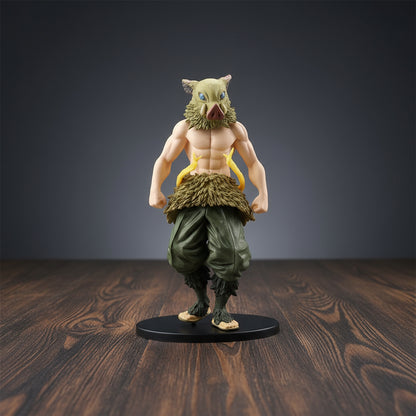 Figurine of a character with a green outfit and animal-like features on a white background