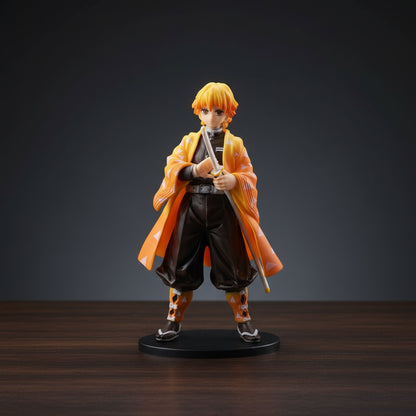 Figurine of an animated character with orange hair and a kimono-like outfit on a white background