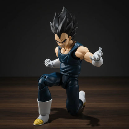 Action figure of a character in a dynamic pose on a wooden floor with a dark background