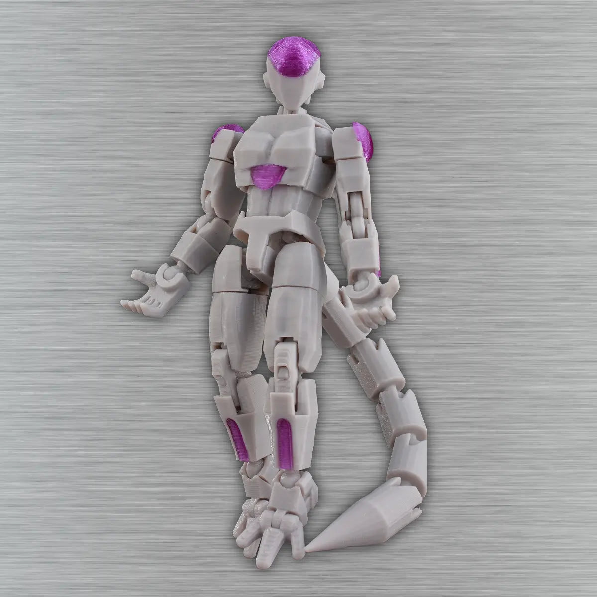 Toy robot figure on a textured gray background