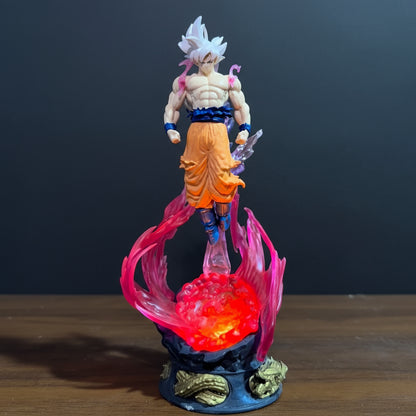 Action figure on a glowing platform against a plain background