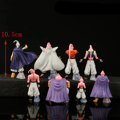 Set of small figurines on a reflective surface with a black background