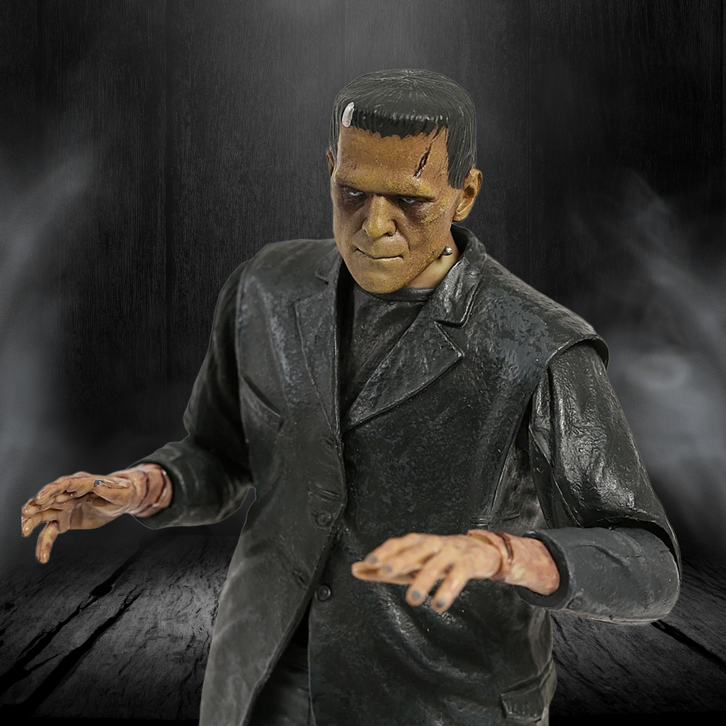 Action figure of a character in a dark coat with a dark background