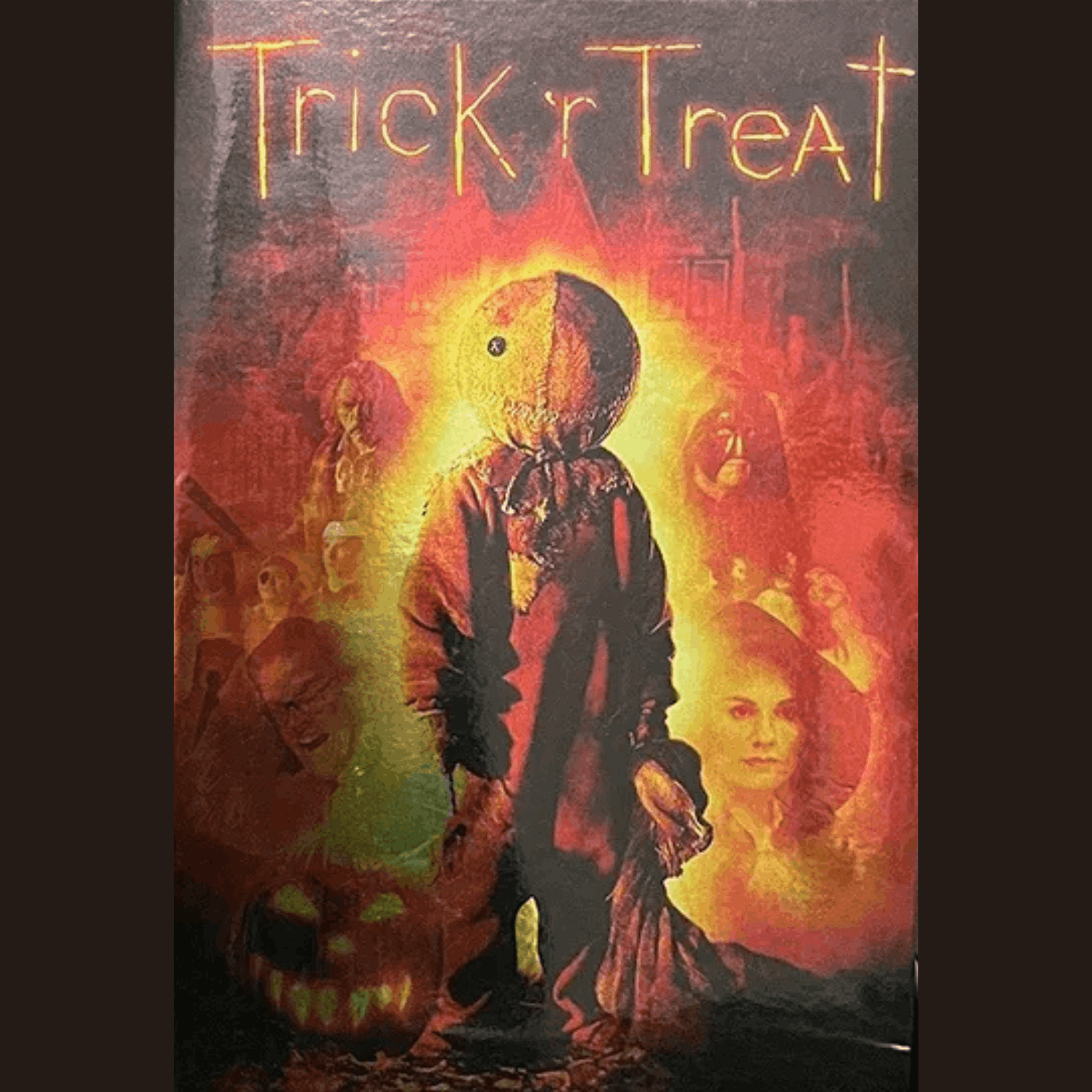 Movie poster for 'Trick 'r Treat' with a hooded figure and pumpkin.