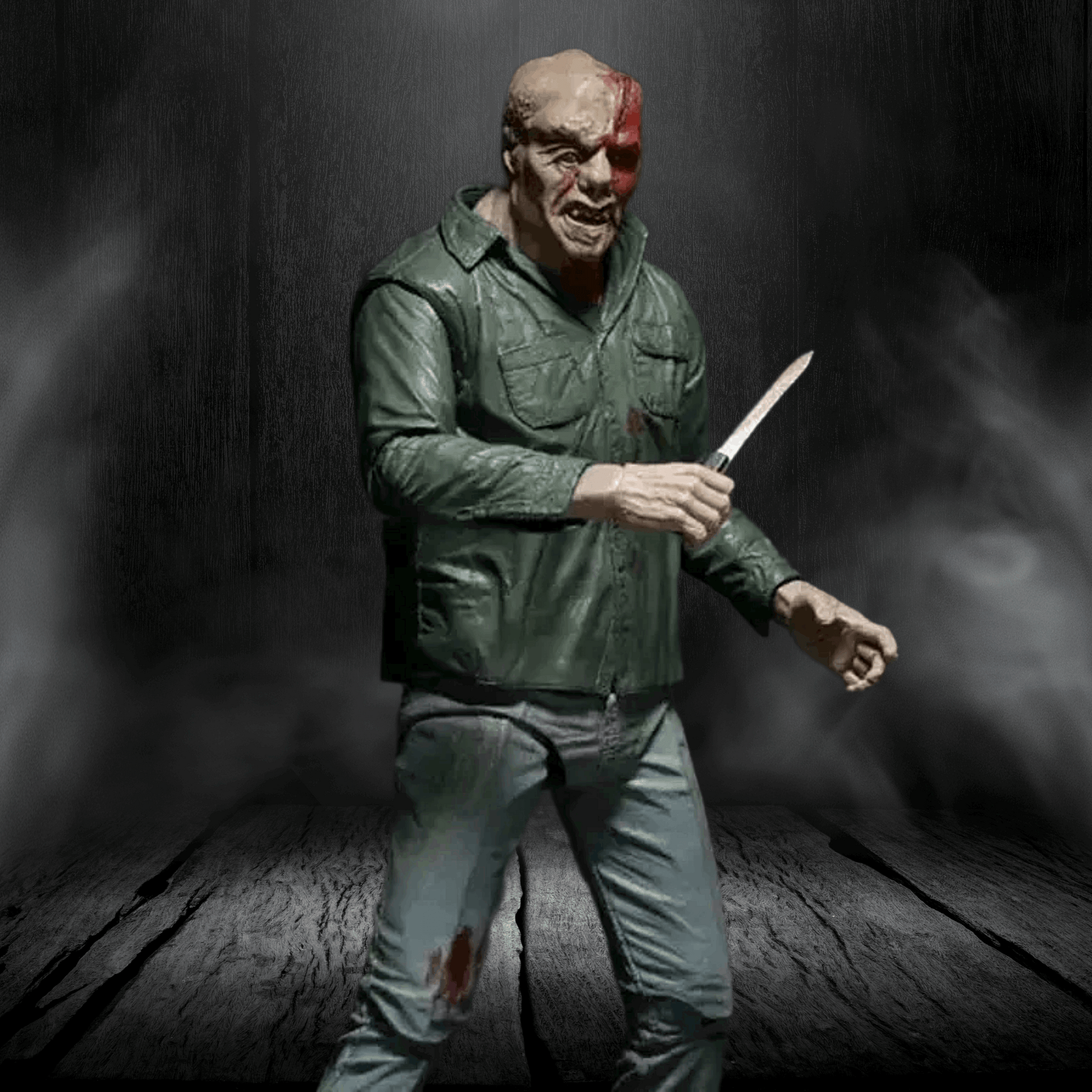 Action figure in a green hoodie holding a knife against a dark background
