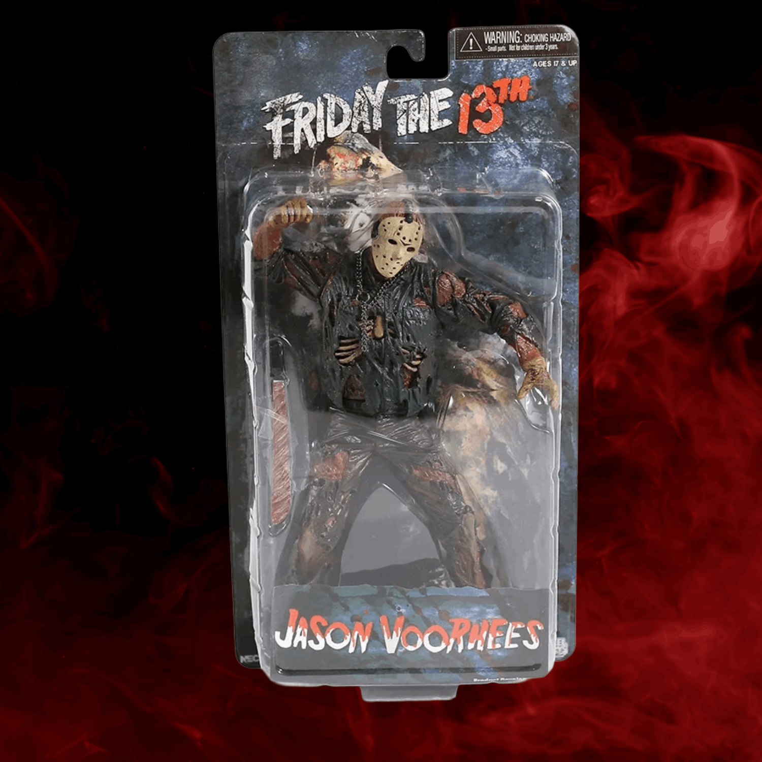 Action figure of Jason Voorhees from 'Friday the 13th' in packaging with a dark red background.