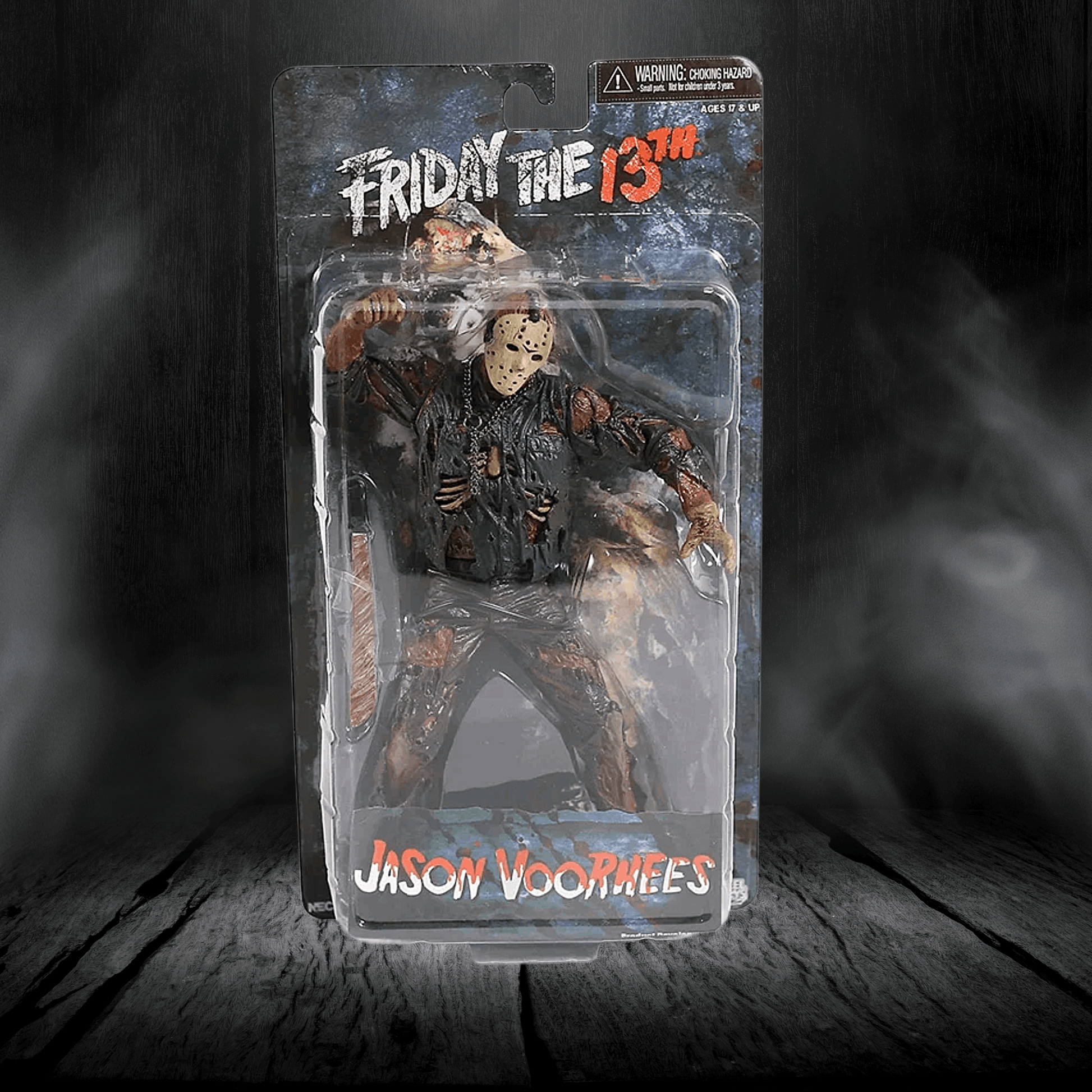 Action figure of Jason Voorhees from 'Friday the 13th' in packaging on a dark background