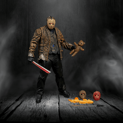 Action figure holding a teddy bear and knife on a dark background
