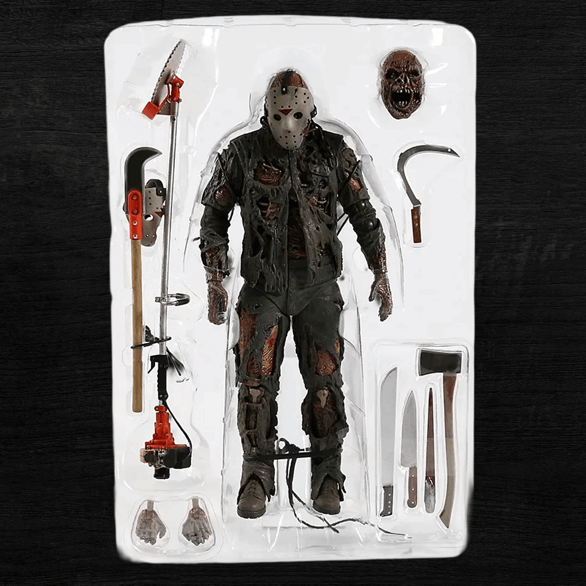 Action figure in a clear packaging tray with tools on a dark background