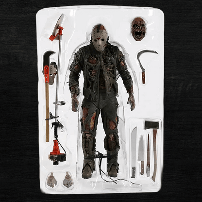 Action figure in a clear packaging tray with tools on a dark background