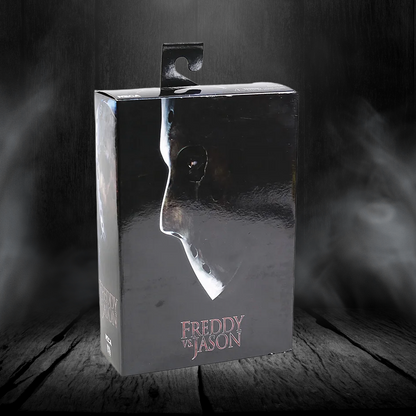 Metallic box with a face cutout and 'Freddy vs. Jason' text on a dark background
