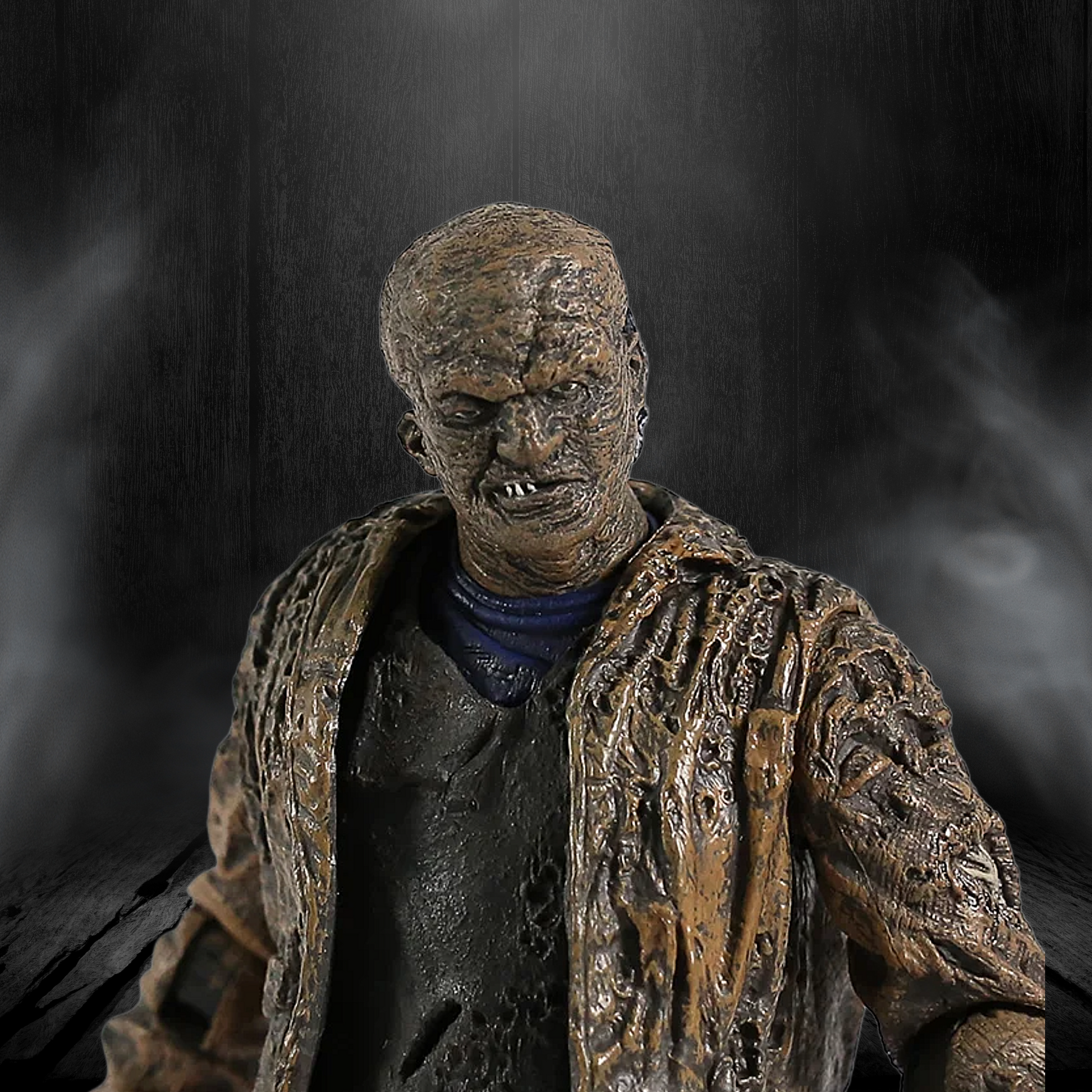 Detailed figurine of a character with a dark, smoky background