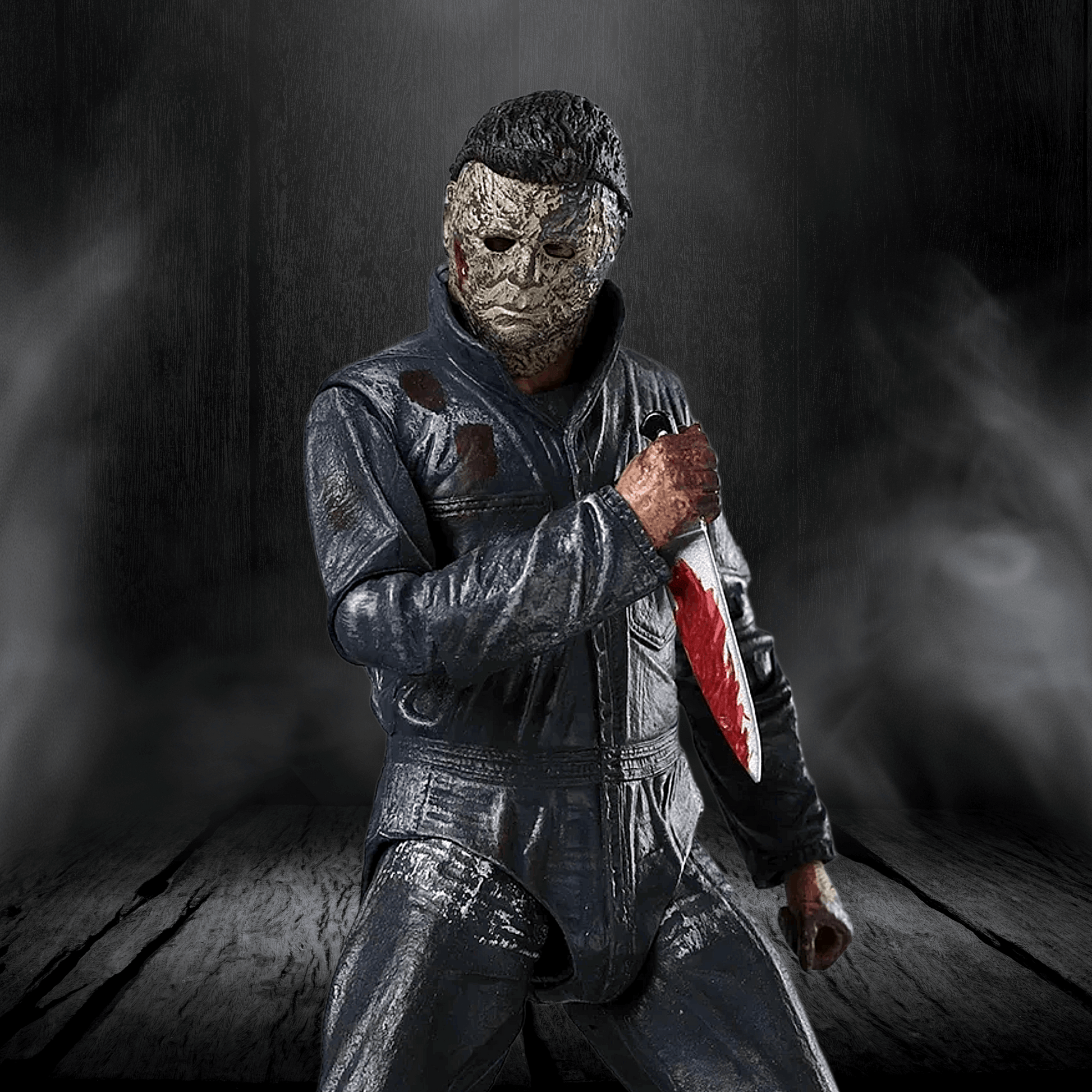 Person in a dark costume with a mask holding a knife on a dark background